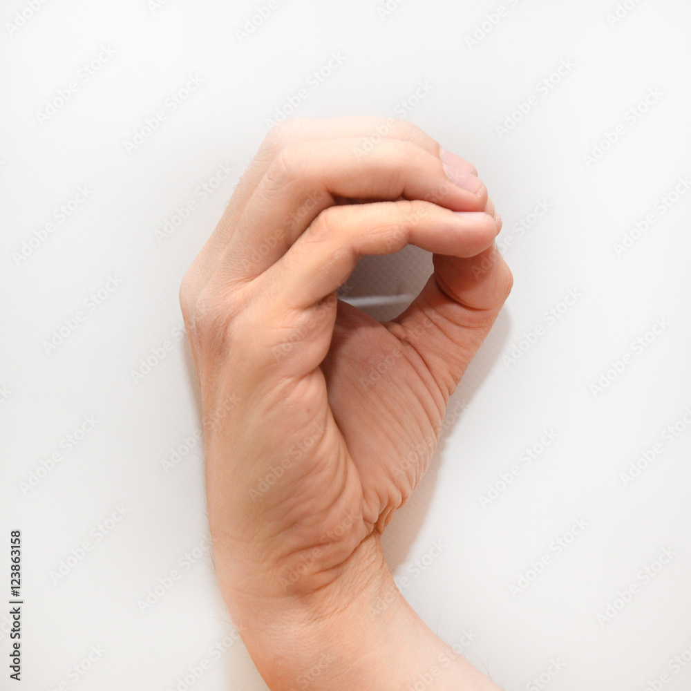 Naklejka premium Letter O in American Sign Language (ASL) for deaf people