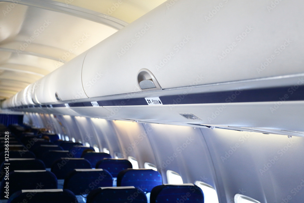 Fototapeta premium White panel for luggage.in airplane