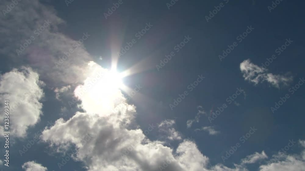4K Time lapse sun shining as clouds travel across sky. 4K Time lapse sun shining as clouds travel across sky.