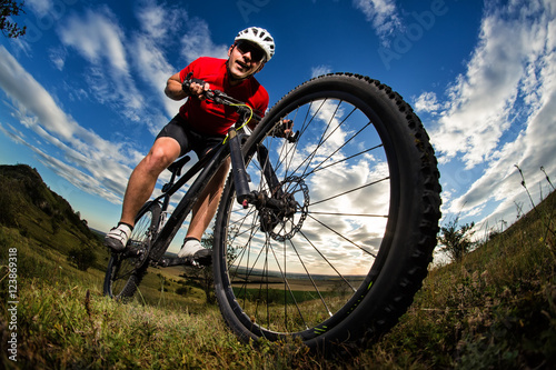 Fototapeta Naklejka Na Ścianę i Meble -  Mountain Bike cyclist riding single track outdoor