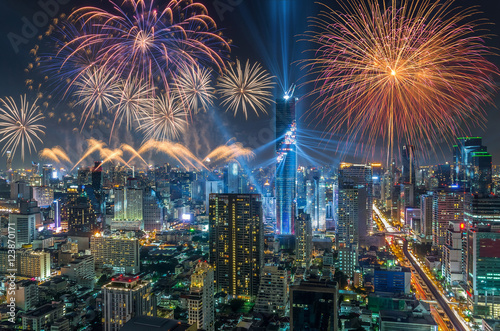 Top view of Bangkok Cityscape at night with Multicolor Firework © THANANIT