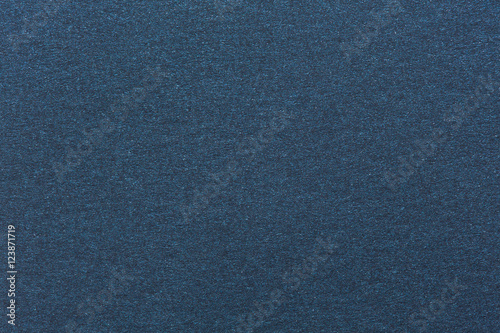 Texture of dark blue color paper.
