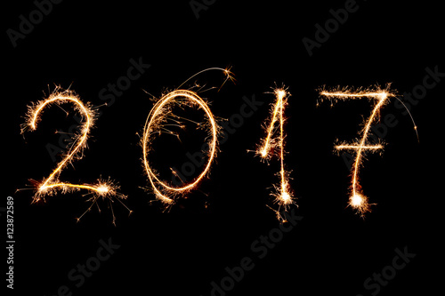 HAPPY NEW YEAR 2017 written with fireworks as a background