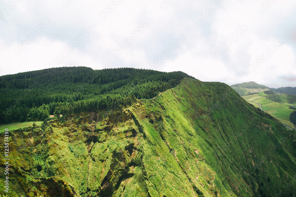 Obraz premium Green mountain hills with forest