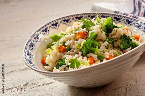 Savory risotto broccoli, carrots and parsley with rice