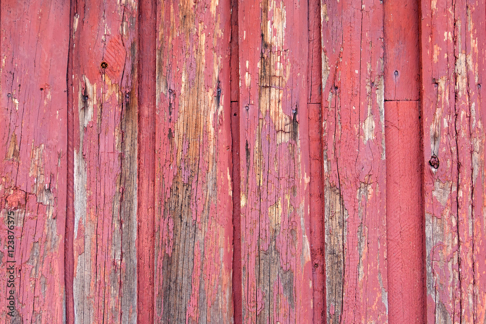 Red painted wood planks as background or texture. Close-up Red painted wood planks as background or texture. Close-up