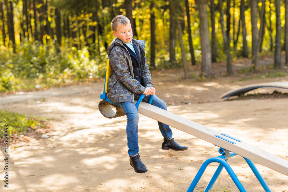 Children playing on a school playground during recess. Children playing on a school playground during recess.