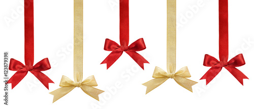 Shiny red and gold satin ribbon on white background