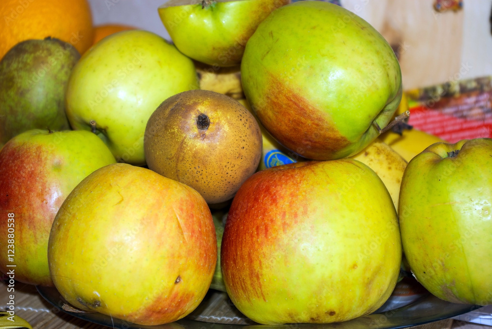 Fresh organic apples and pears on a table