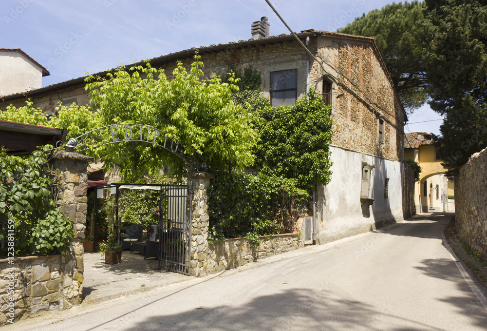 External view of the entrance of historical traditional restaurant on Tuscan Hills