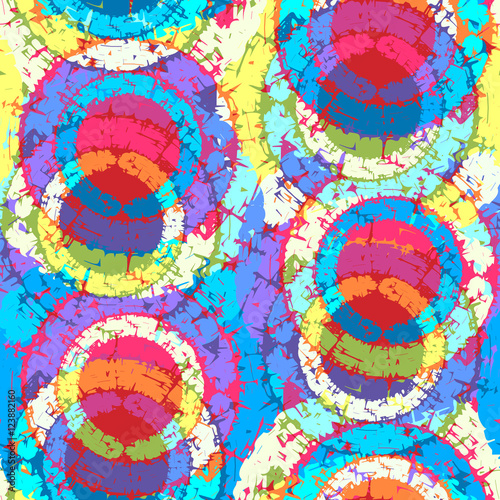 Abstract grunge seamless chaotic pattern with annular brushstrokes. Urban camouflage texture. Trendy colorful background. Modern wallpaper. Fashionable print with a shabby paint effect.