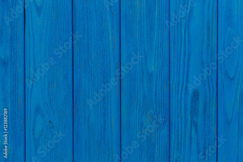 Shabby wooden vertical planks background with copyspace, blue color