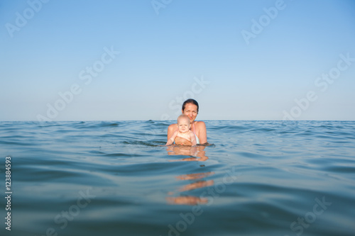 Mom and daughter in the sea