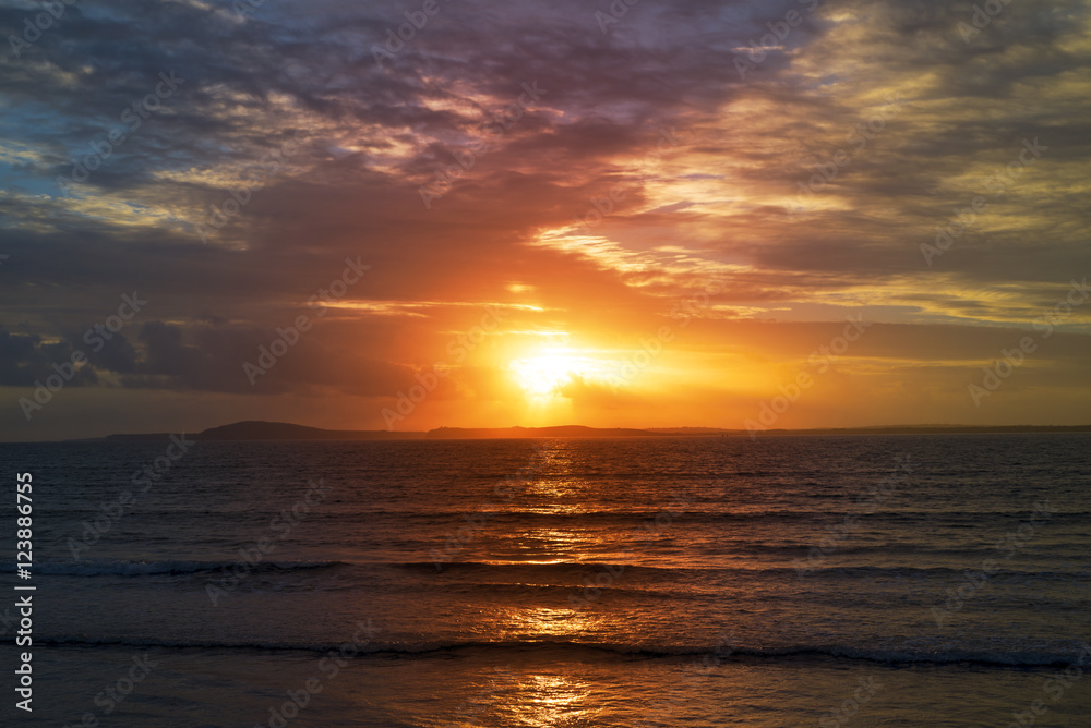 beautiful orange sunset rays from beal beach