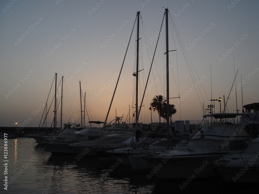 Calm evening over a small bay with boats and yachts