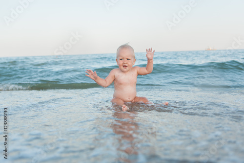 Little girl frolics in the sea