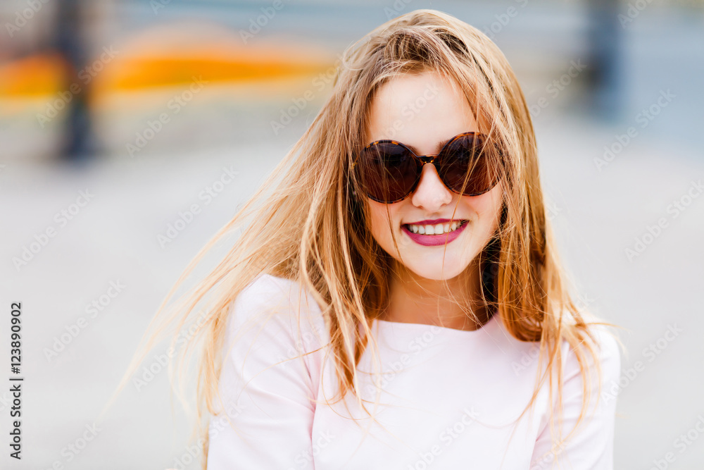 portrait of cute amazing smiling in sunglasses girl,