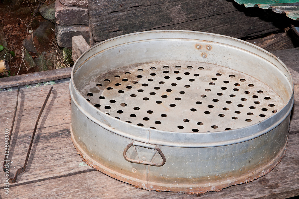 Fototapeta premium Old steamer pot on the stove in table