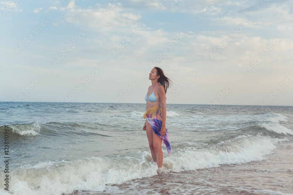 Fototapeta premium Brunette on the beach