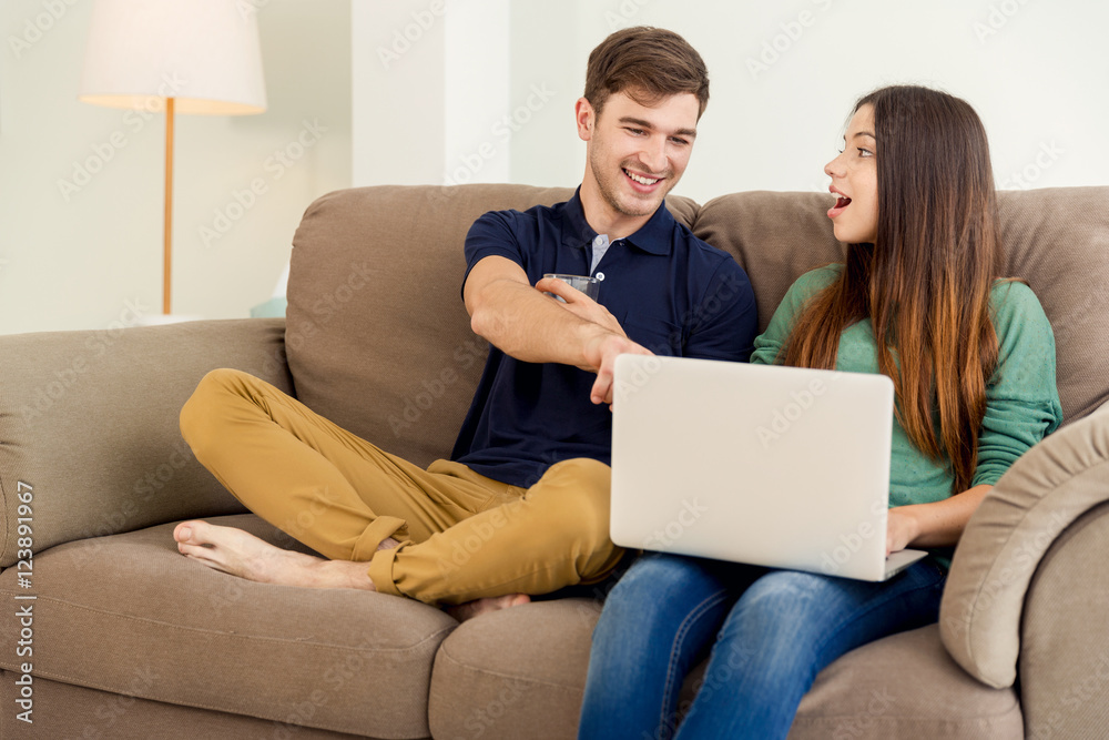 Watching something on a laptop Watching something on a laptop