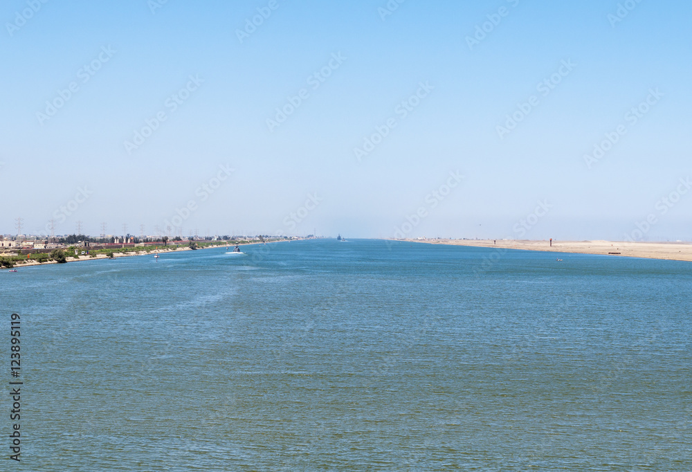 Suez canal. The Suez Canal is an artificial sea-level waterway in Egypt, connecting the Mediterranean Sea to the Red Sea through the Isthmus of Suez. 
