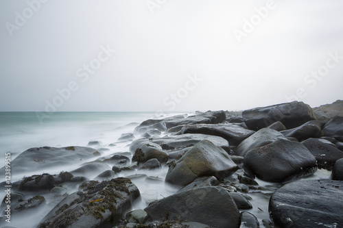 Wet rocks on Flakstad beach, Lofoten Islands, Norway