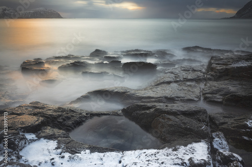 Vareid beach at dusk in the wintertime, Lofoten Islands, Norway