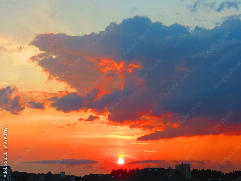 Fototapeta premium Over the houses sunset