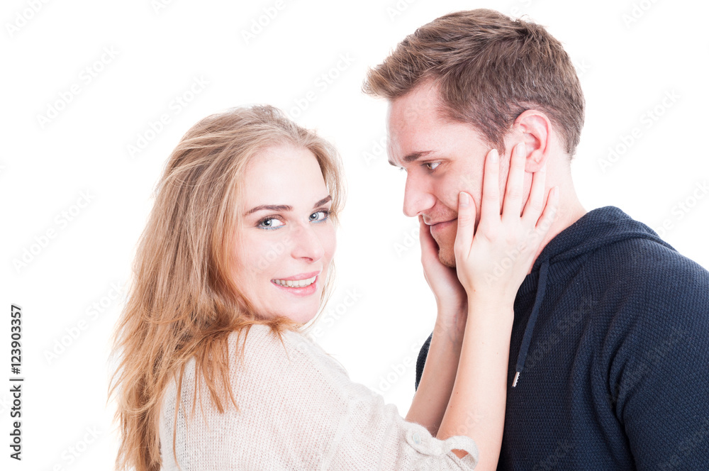 Happy couple portrait cuddling and being affective Happy couple portrait cuddling and being affective