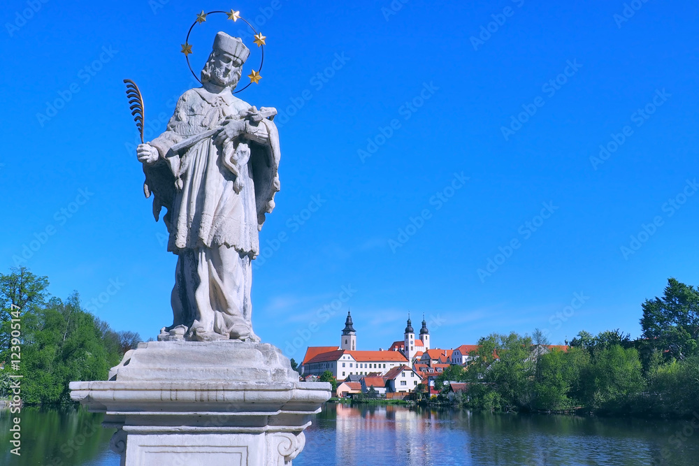 View of Telc town with statue of St. John of Nepomuk, UNESCO World heritage site in Czech Republic