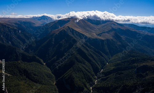Aerial view of the beautiful mountain valley with river.