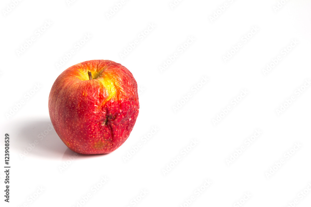 Wizen apple presented as old aging skin Wizen apple presented as old aging skin