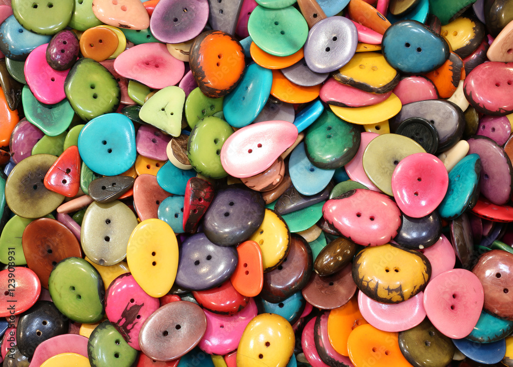background of colorful buttons made with dried palm seeds for sa background of colorful buttons made with dried palm seeds for sa