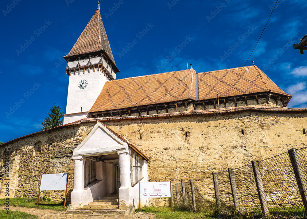 Fototapeta premium Mesendorf fortified church in a traditional saxon village in Transylvania, Romania