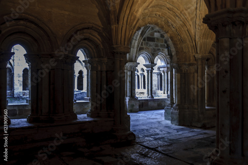 sight of the galleries of the cloister with arches  props and columns of the Romanesque abbey of Santa Maria the Real one in aguilar of Campoo  Palencia  Spain