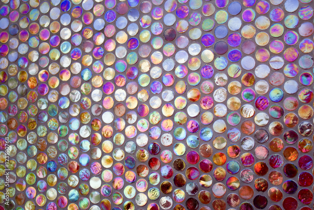 abstract pattern wall made of colored glass circles spheres