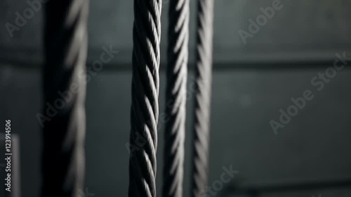 Four elevator hoist metal ropes stopping, mine shaft lifting system