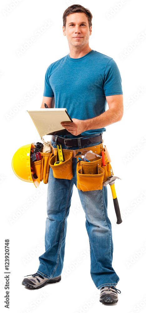 Full-length construction worker contractor carpenter with clipboard isolated on white background for use alone or as a design element Full-length construction worker contractor carpenter with clipboard isolated on white background for use alone or as a design element