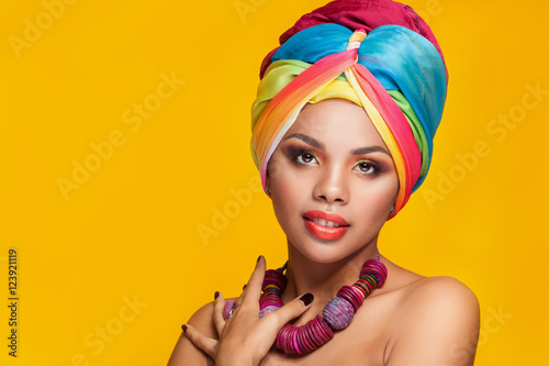 Fotografie, Obraz Gorgeous afro-american girl in national turban