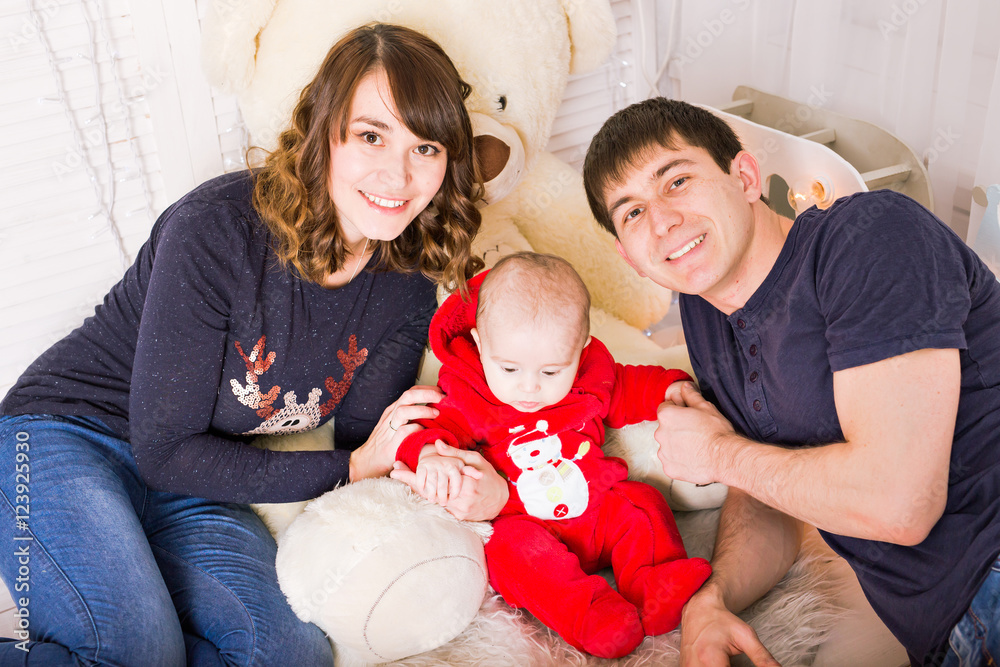 Young couple with their newborn baby Young couple with their newborn baby