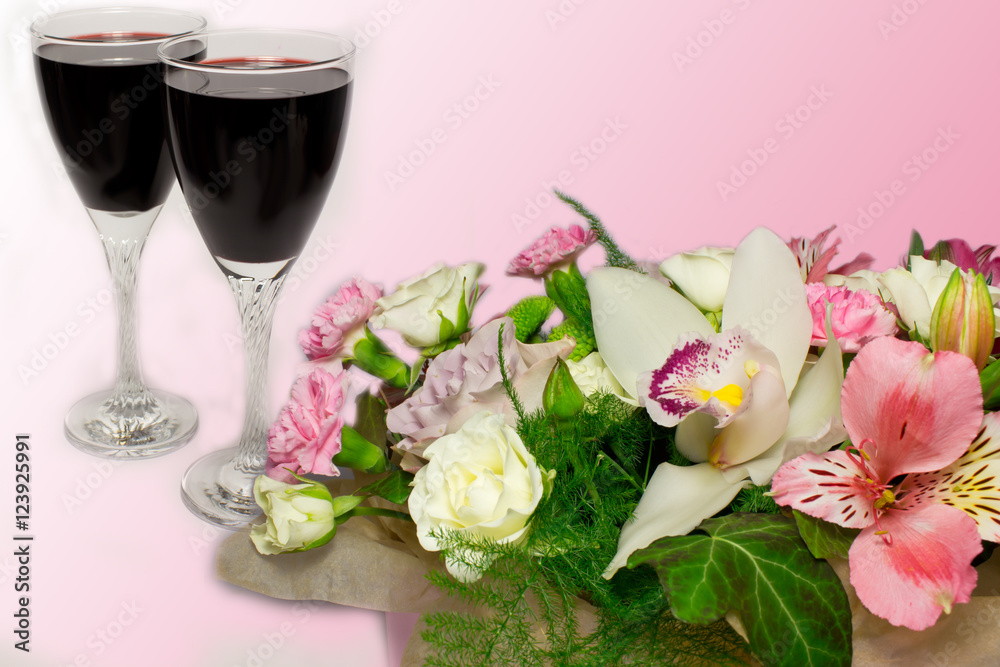 Beautiful bouquet and two Wine Glasses Beautiful bouquet and two Wine Glasses