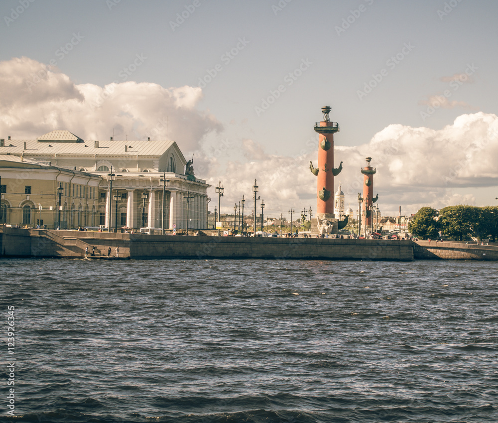 View of arrow of Vasilevsky island and Rostral columns. Saint Petersburg, Russia. Vintage processing