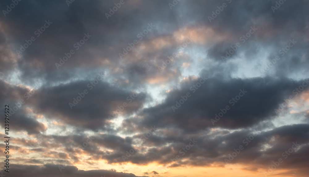 Cloudy sky in sunset colors