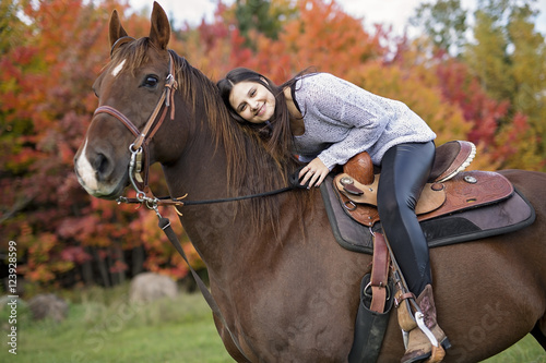 Beautiful girl with black hair horse
