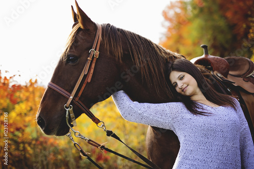 Beautiful girl with black hair   horse © Louis-Photo