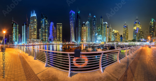 Photography Panoramic view of Dubai Marina bay with yacht and cloudy sky, Dubai, UAE