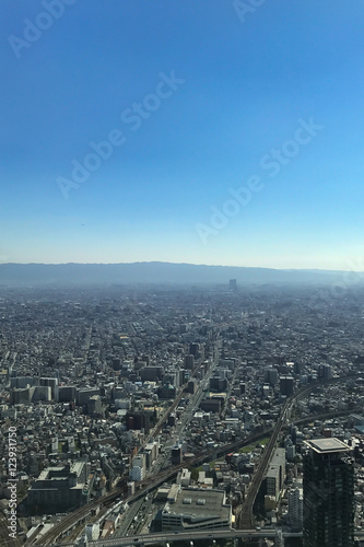 OSAKA JAPAN - 15 OCTOBER, 2016: Osaka city view from Abeno Harukas building in Tennoji. Abeno Harukas is a multi-purpose commercial facility and is the tallest building in Japan. © kenstock