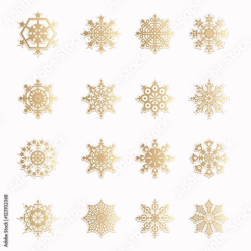 Various golden winter snowflakes. Vector set