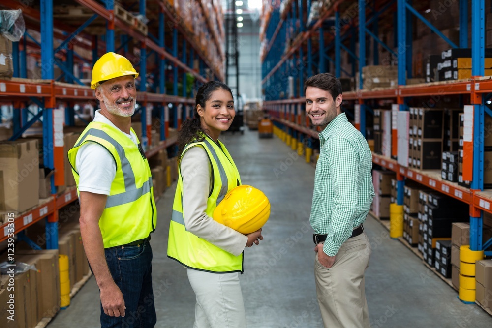 Portrait of warehouse team standing together Portrait of warehouse team standing together