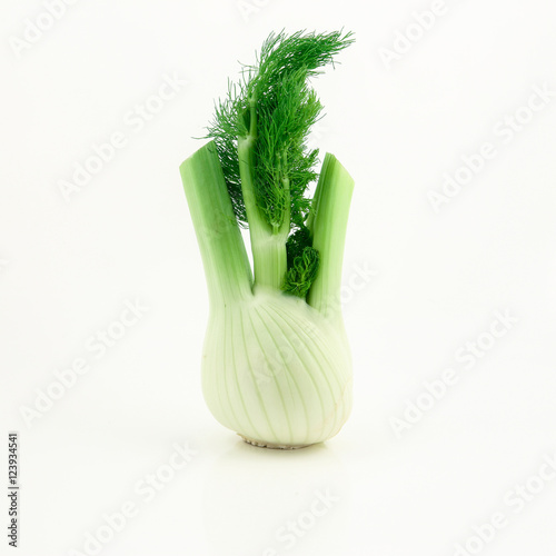 Organic vegetables and fruits in wicker basket isolated